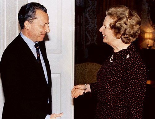 British Premier Margaret Thatcher greets French economist Jacques Delors, the president-elect of the Commission of European Communities at 10 Downing Street in London, Oct 15, 1984. (AP Photo)