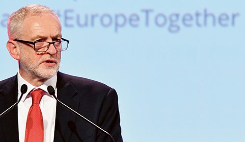 Britain's Labour Party leader Jeremy Corbyn speeches prior to a meeting of European Socialists prior to an EU summit in Brussels on Thursday, Oct. 19, 2017. European Union leaders are gathering for a two day summit to discuss migration, digital economy and Brexit. (AP Photo/Geert Vanden Wijngaert)